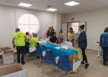 Momento de la recogida de dorsales.