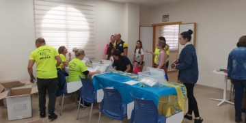 Momento de la recogida de dorsales.