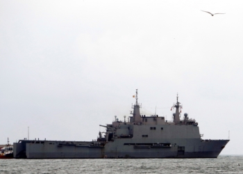 Spanish Navy's Galicia amphibious assault ship (C) leaves the port in its way to Ceuta, in Melilla, Spanish enclave in northern Africa, 09 April 2020. The ship departs for the closer Ceuta to collaborate with local authorities amid coronavirus outbreak. Spain faces the 26th consecutive day of mandatory home confinement in a bid to slow down the spread of the pandemic COVID-19 disease caused by the SARS-CoV-2 coronavirus. EFE/F.G.Guerrero