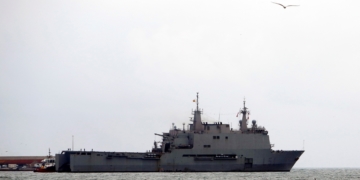 Spanish Navy's Galicia amphibious assault ship (C) leaves the port in its way to Ceuta, in Melilla, Spanish enclave in northern Africa, 09 April 2020. The ship departs for the closer Ceuta to collaborate with local authorities amid coronavirus outbreak. Spain faces the 26th consecutive day of mandatory home confinement in a bid to slow down the spread of the pandemic COVID-19 disease caused by the SARS-CoV-2 coronavirus. EFE/F.G.Guerrero