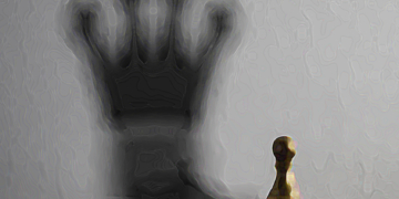Chessman is changed to the shadow of the crown. Idea concept