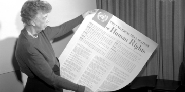 Mrs. Eleanor Roosevelt of the United States holding a Declaration of Human Rights poster in English. [Exact date unknown]