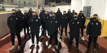 Componentes de la escuadra del MSC Peña Real Madrid, tras pasar los test de antígenos.