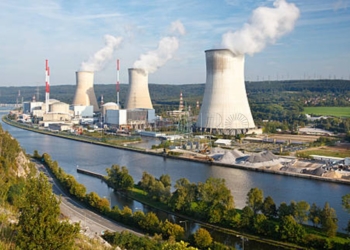 "Shot of the nuclear power plant in Tihange, Belgium at the river Meuse seen from a hill."