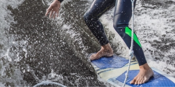 man on wakesurfing. wave from the boat.