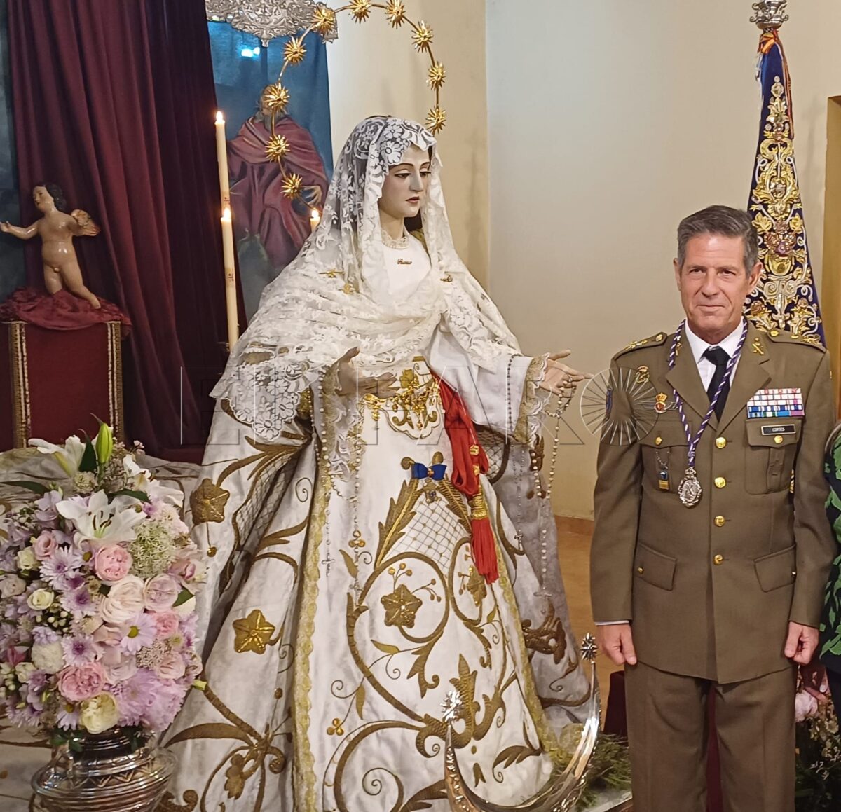 María Santísima del Rocío recibe el fajín de General