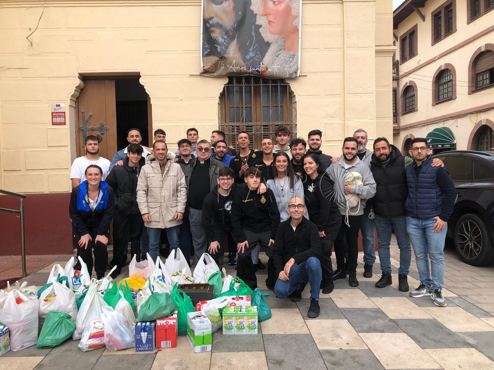 La lluvia interrumpe el III Ensayo Solidario del Nazareno, pero no su compromiso con Cáritas