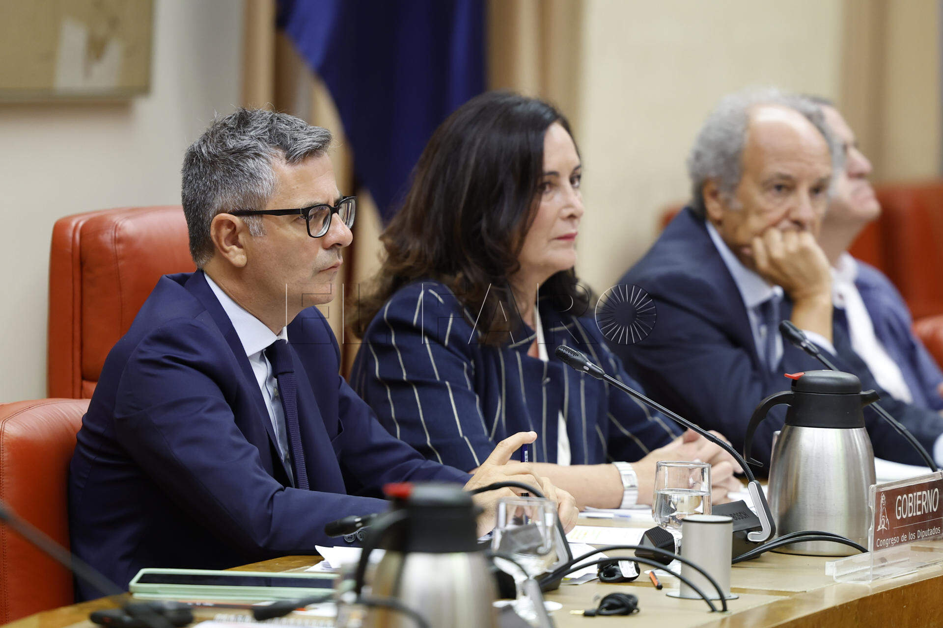 MADRID, 27/08/2026.- El ministro de Justicia, Felix Bolaños (i), sentado entre la presidenta de la Comisión, la popular Edurne Uriarte (2i), comparece este jueves en la Comisión Mixta de Seguridad Nacional del Congreso para informar de la gestión de la crisis migratoria en Ceuta. EFE/ Mariscal